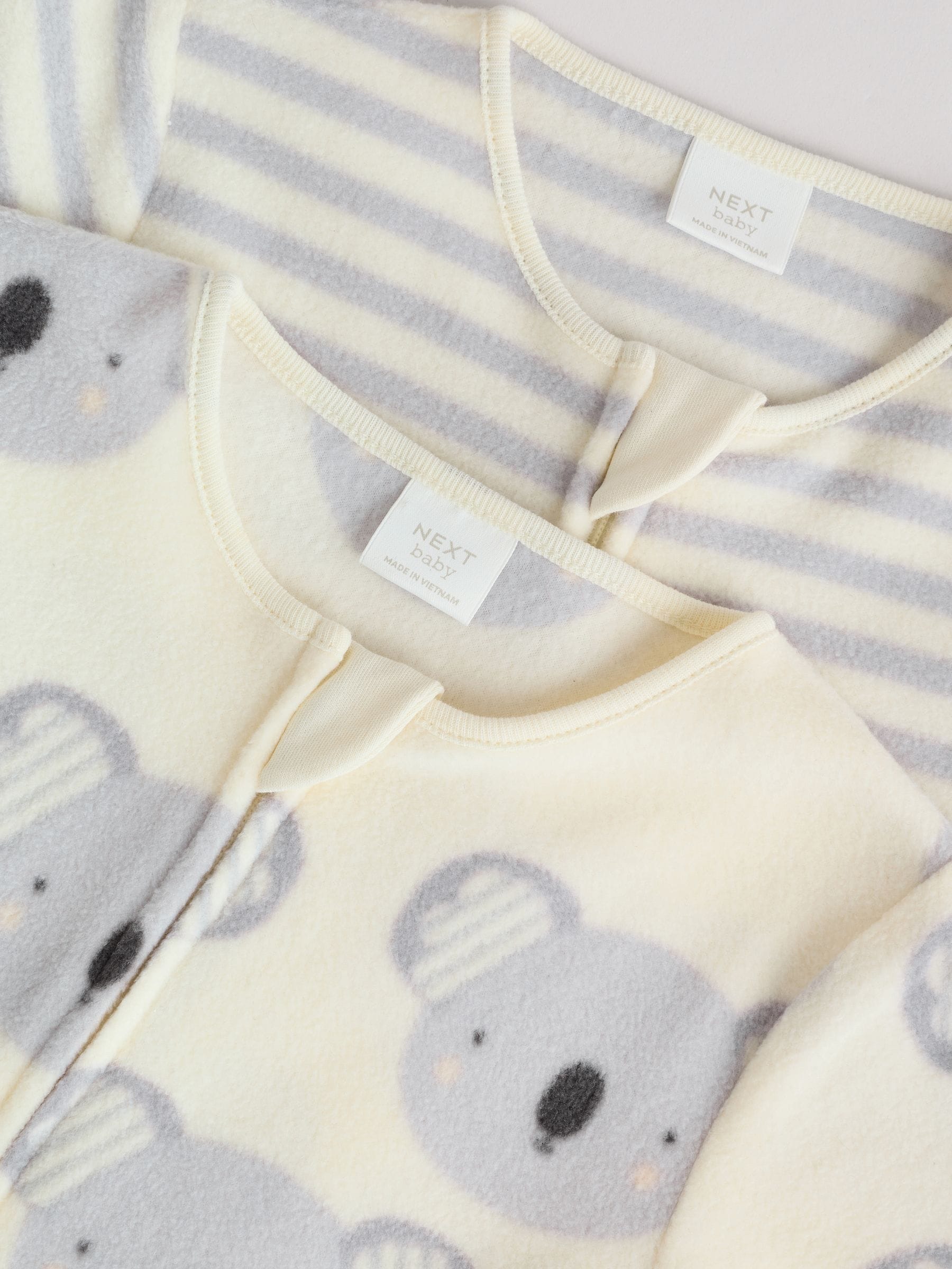 Grijs - Set van 2 baby-onesies van microfleece met tweewegrits