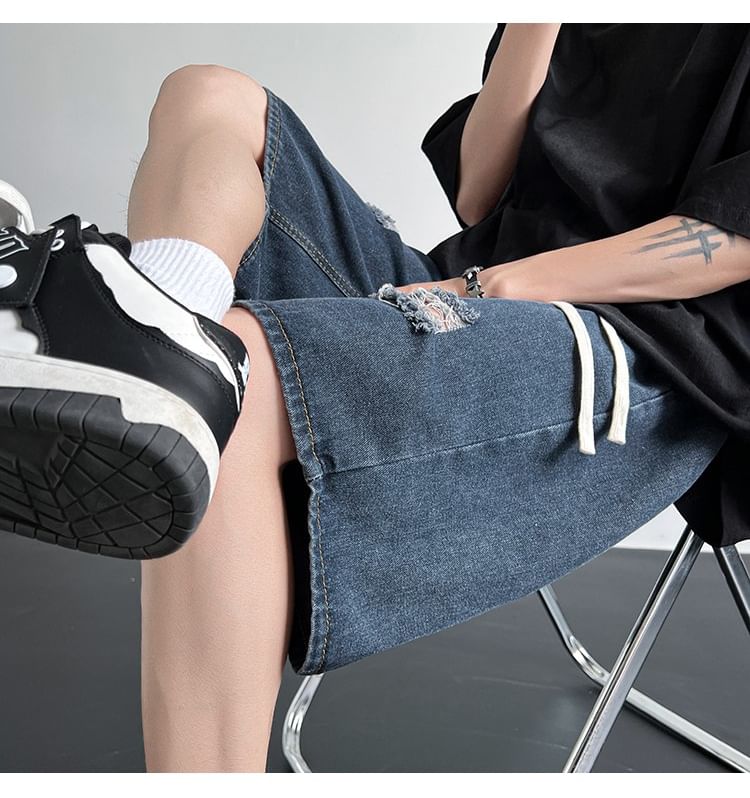 Femilina - Hoge taille denim shorts met distressed effect