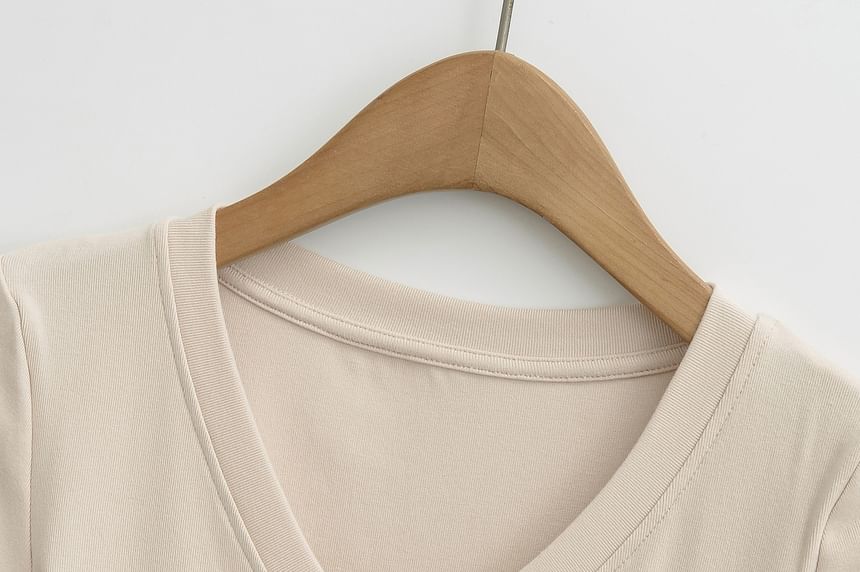 Asiris - Effen T-shirt met korte mouwen en V-hals
