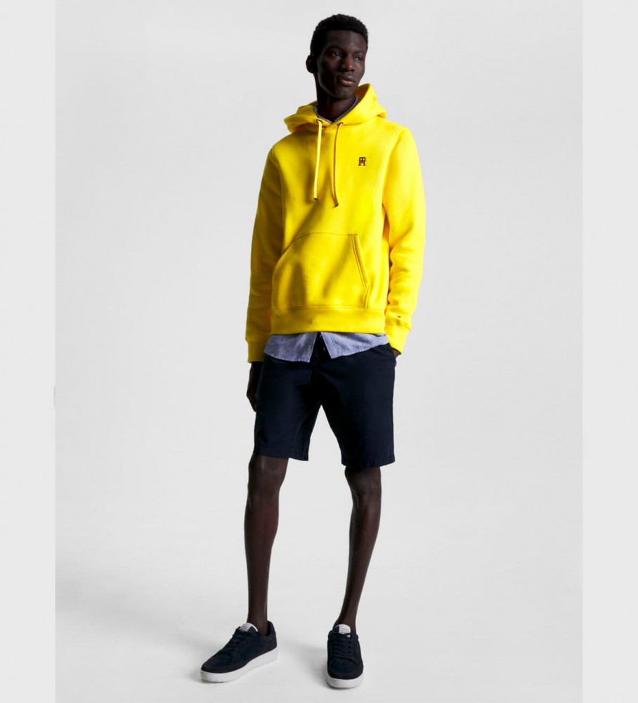 Tênis Tommy Hilfiger azul-marinho de camurça com sola de borracha.