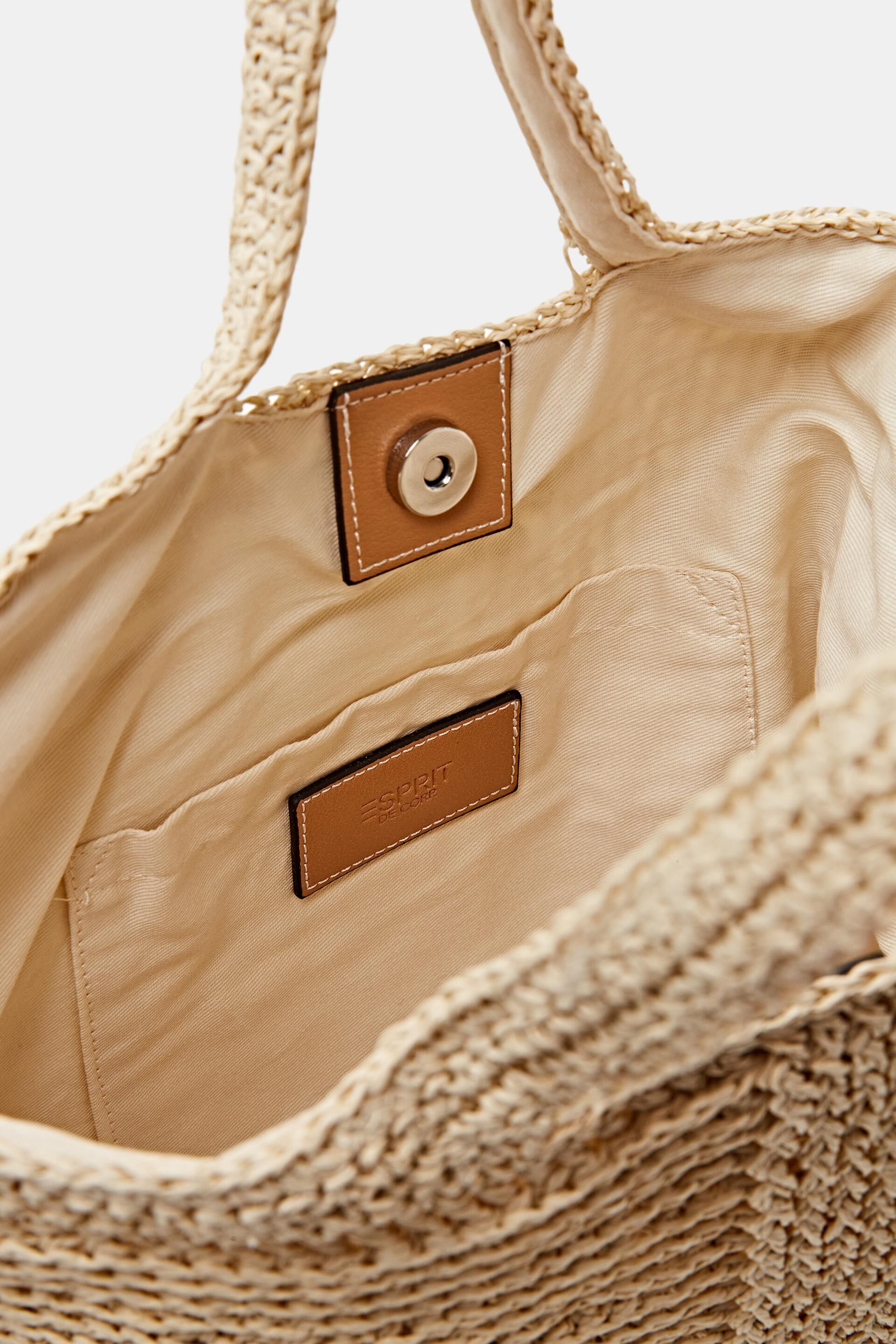 Sac en raphia tissé bordé de similicuir
