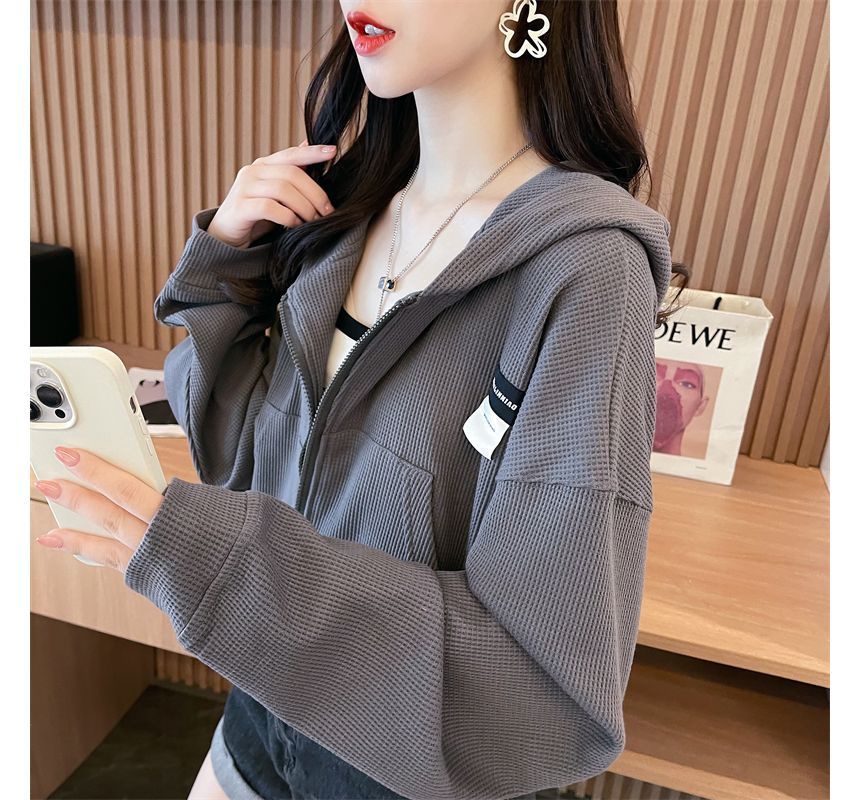 Jewie - Hoodie met rits en letters
