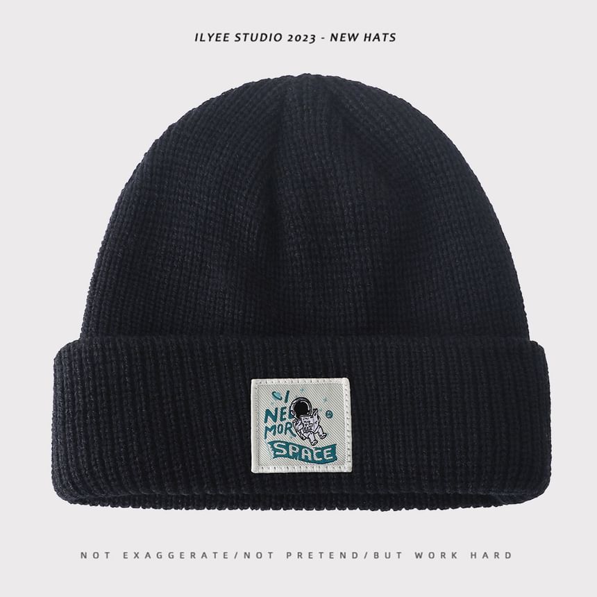 Uweiifame - Effen muts met appliqué
