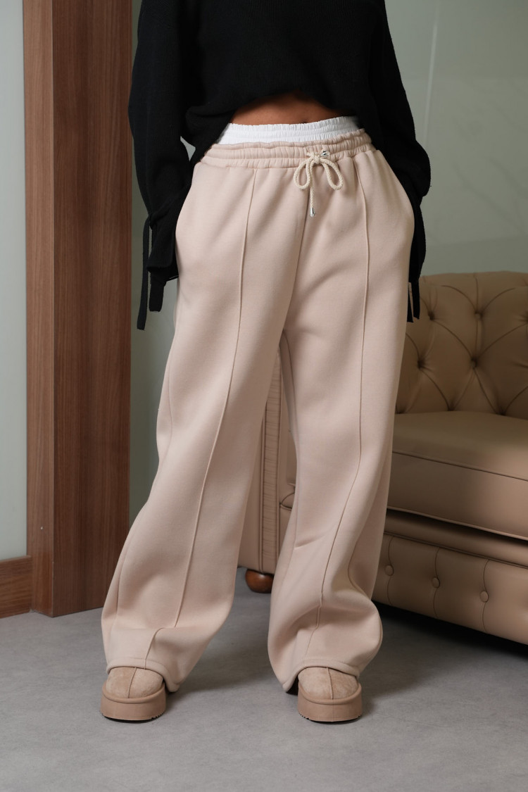 Jogging large beige avec empiècement blanc