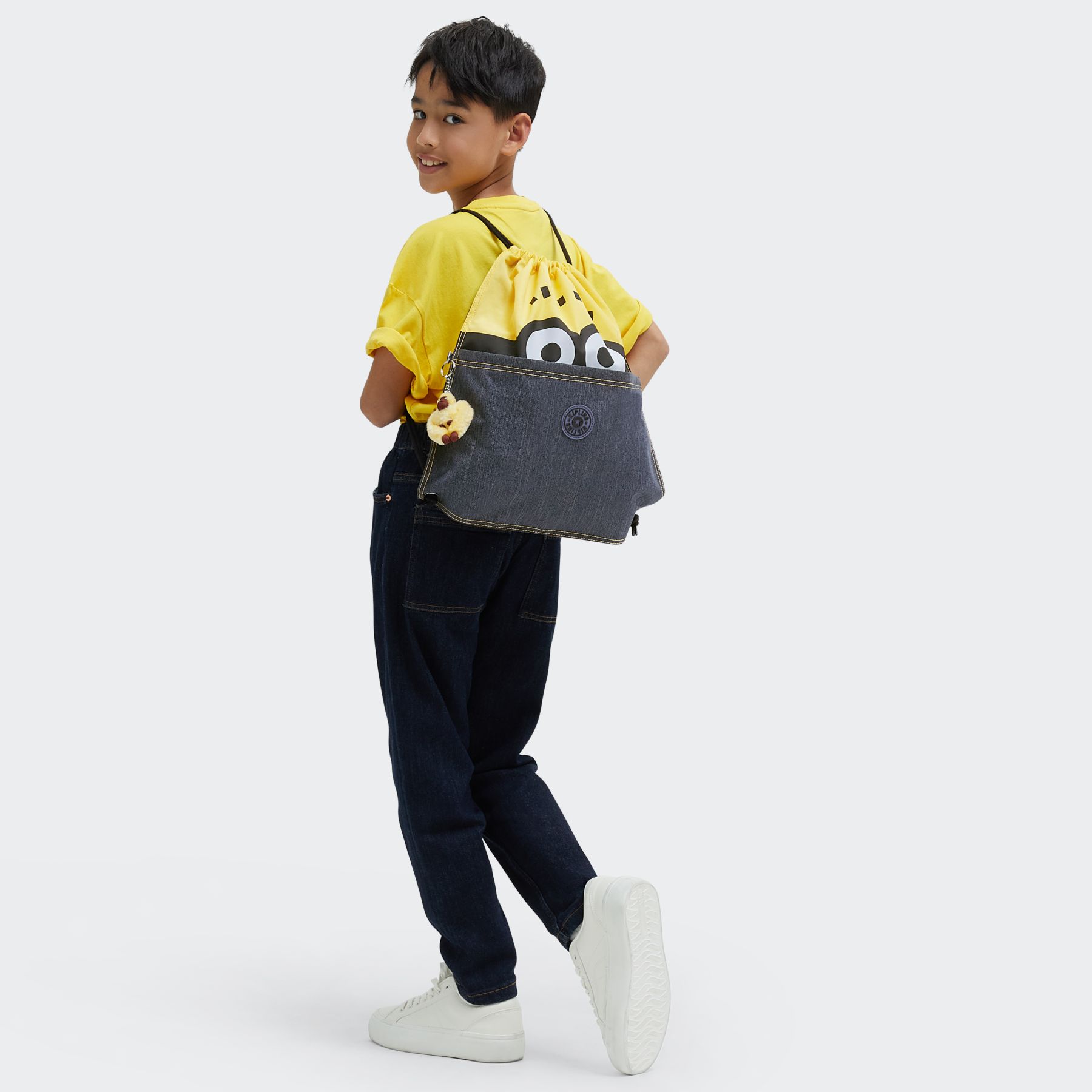 SUPERTABOO Sac à dos Minions Supertaboo avec cordon de serrage - Minion Jeans Block